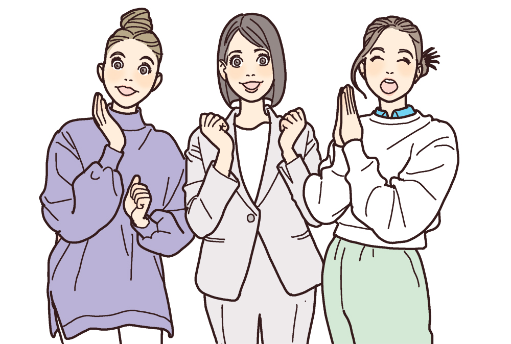 笑顔でポーズをとる3人の女性