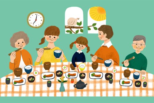三世代の家族が和朝食を囲む様子
