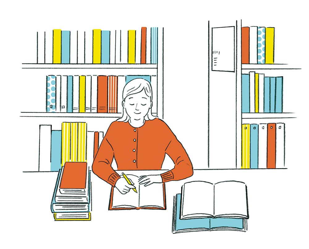 woman studying books library