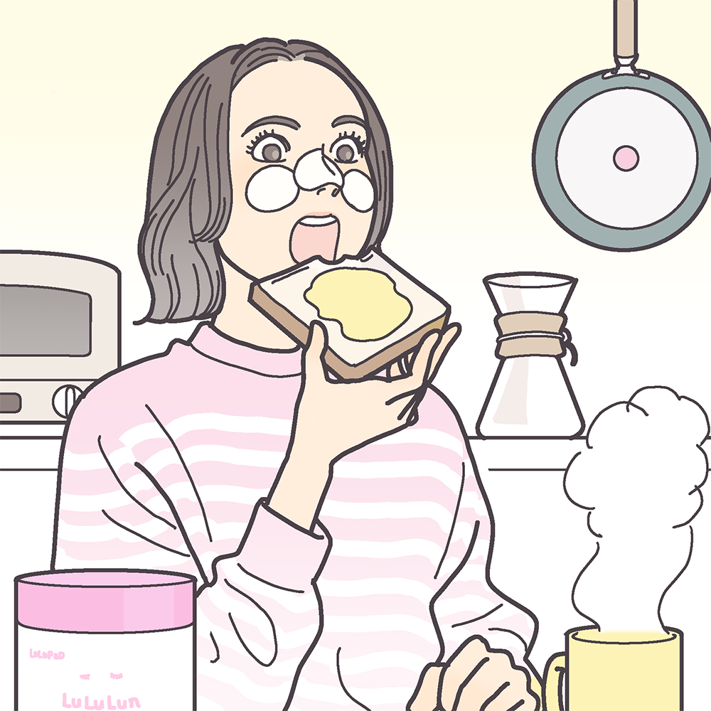 朝食中の女性